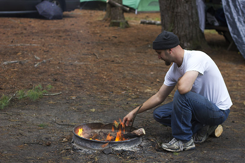 Steve starting a fire