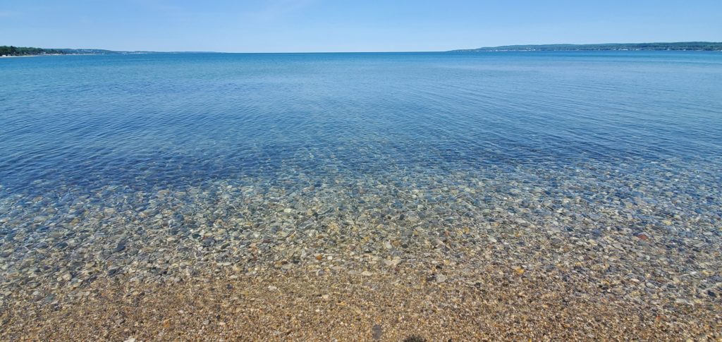 Crystal clear water with rocky bottom