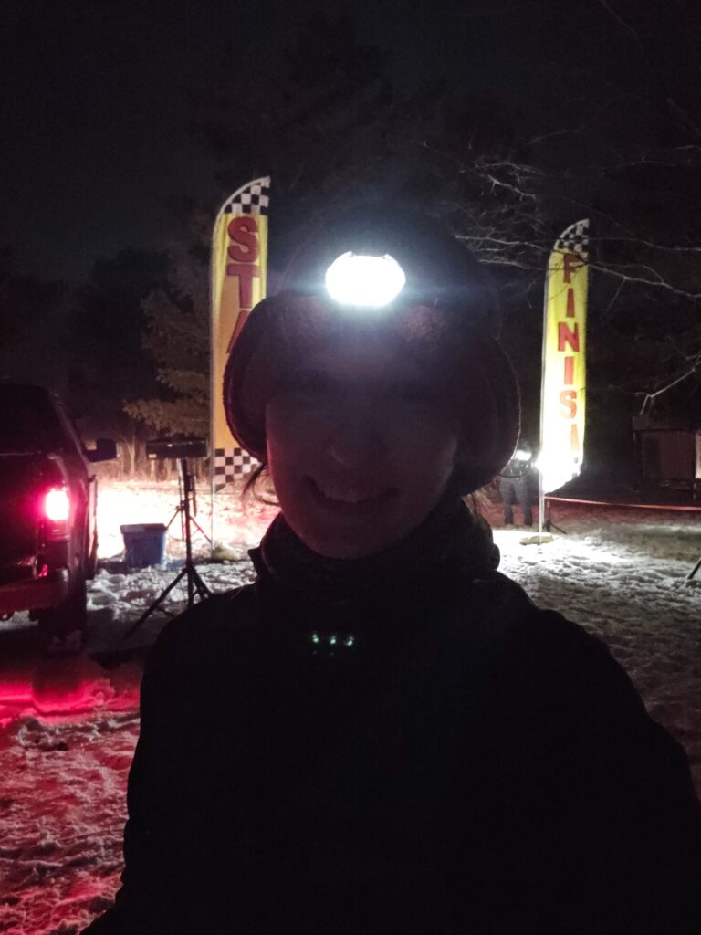 Amie at the finish line of the Full Moon 5