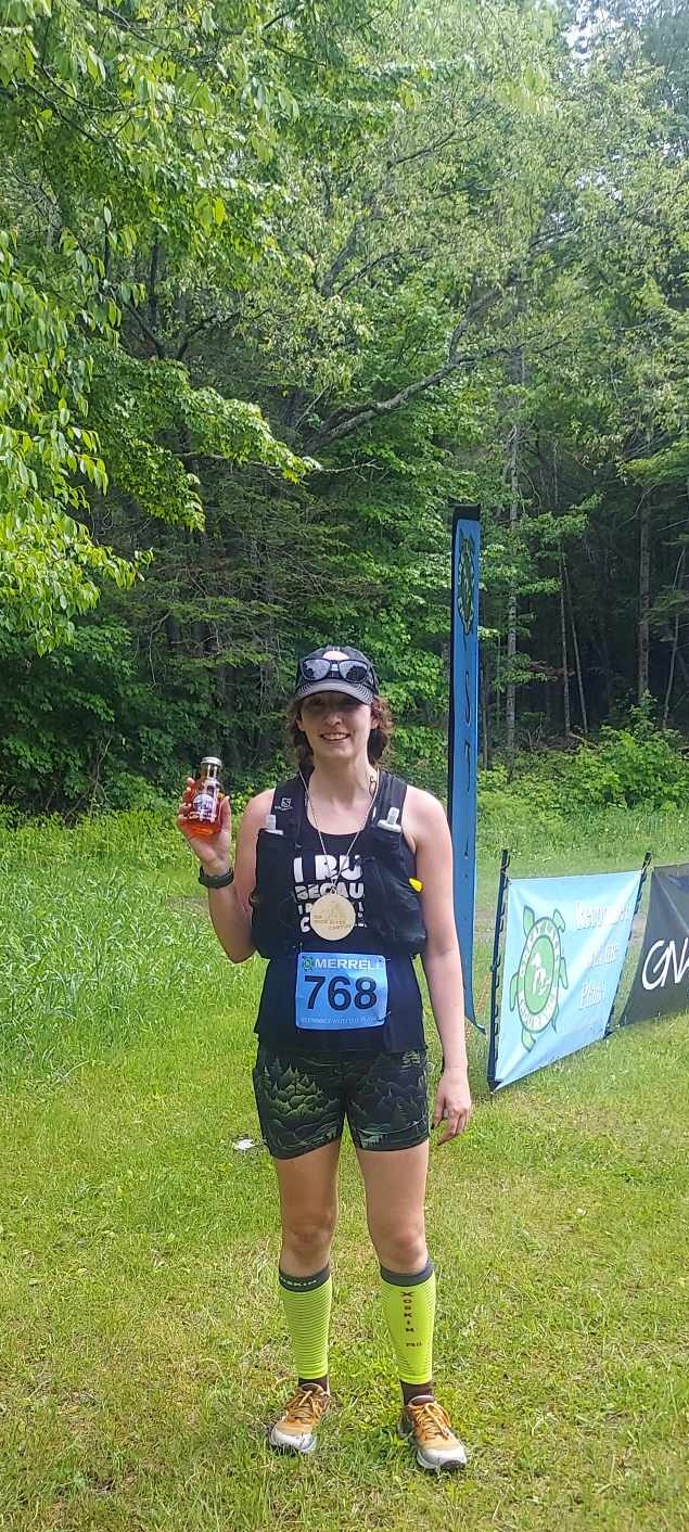 Amie at the Finish of Rock River Canyon 50K