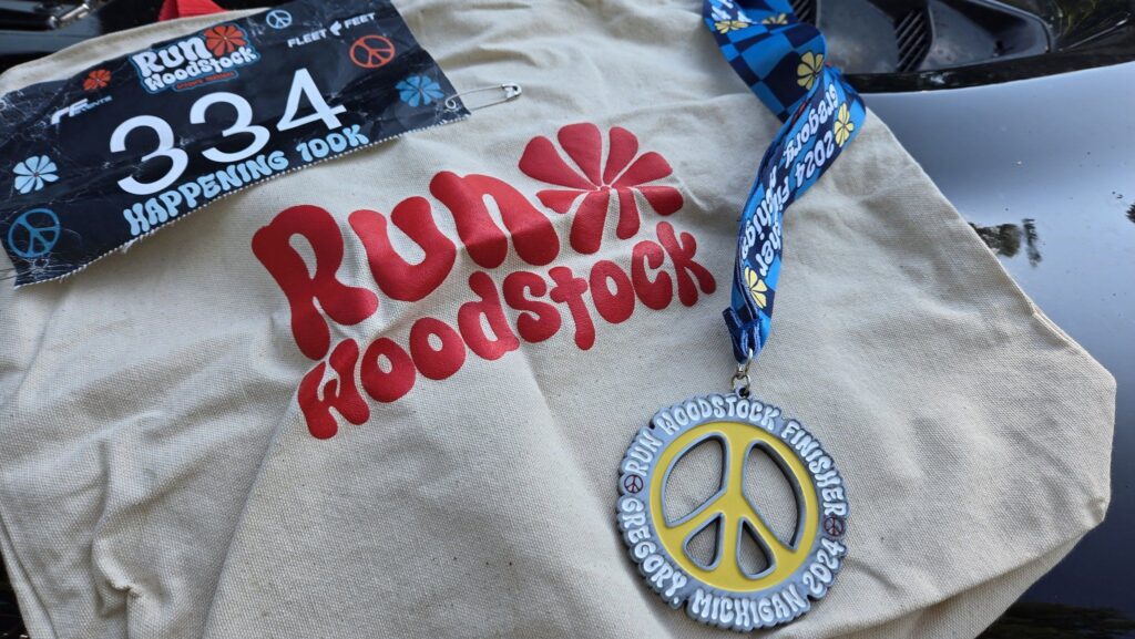 Run Woodstock bag, finisher medal, and bib