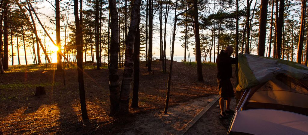 Steve setting up a tent at Twelve Mile Beach