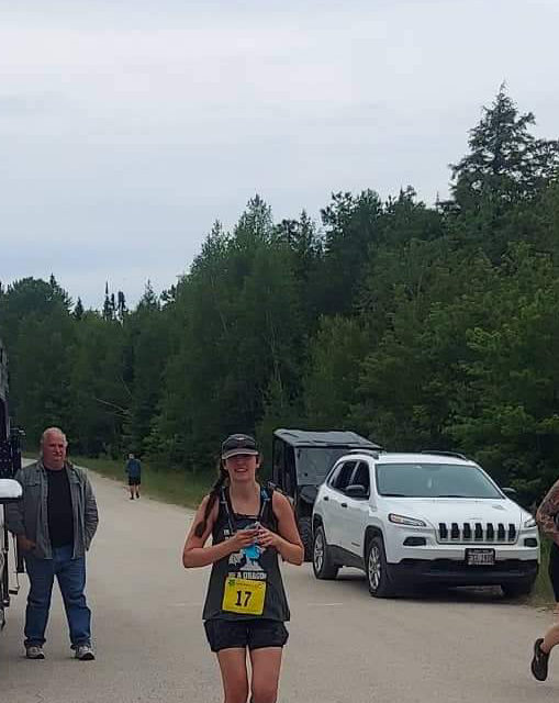 Amie running at one of the aid stations