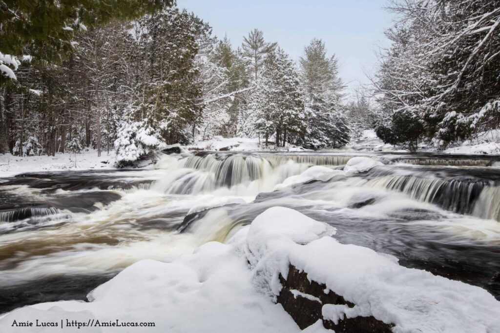 The small drops of upper bond falls covered with snow