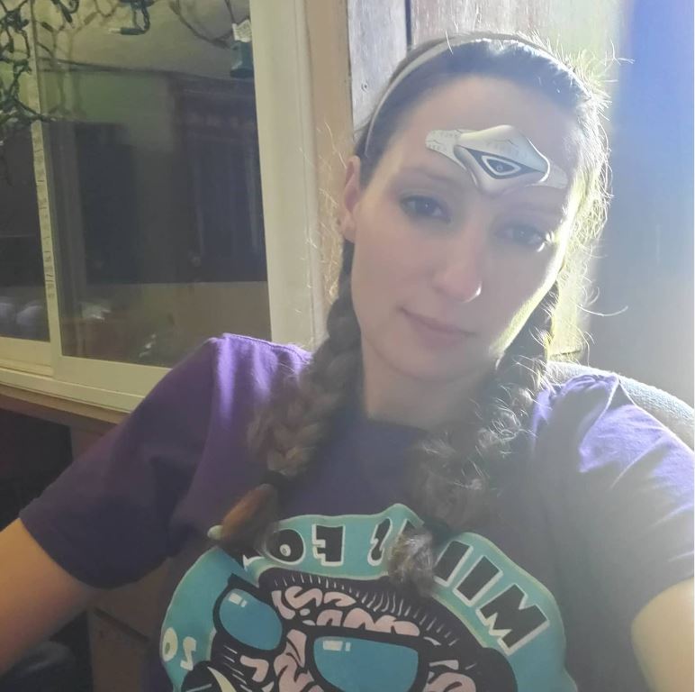 Amie getting treatment with a Cefaly Device