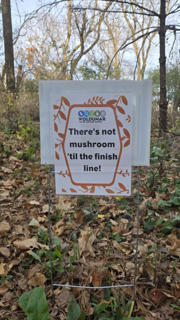 Sign along the Woldumar Course that says There's not mushroom 'til the finish!