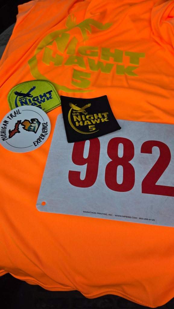 t-shirt, bib, patches, and sticker from Nighthawk 5