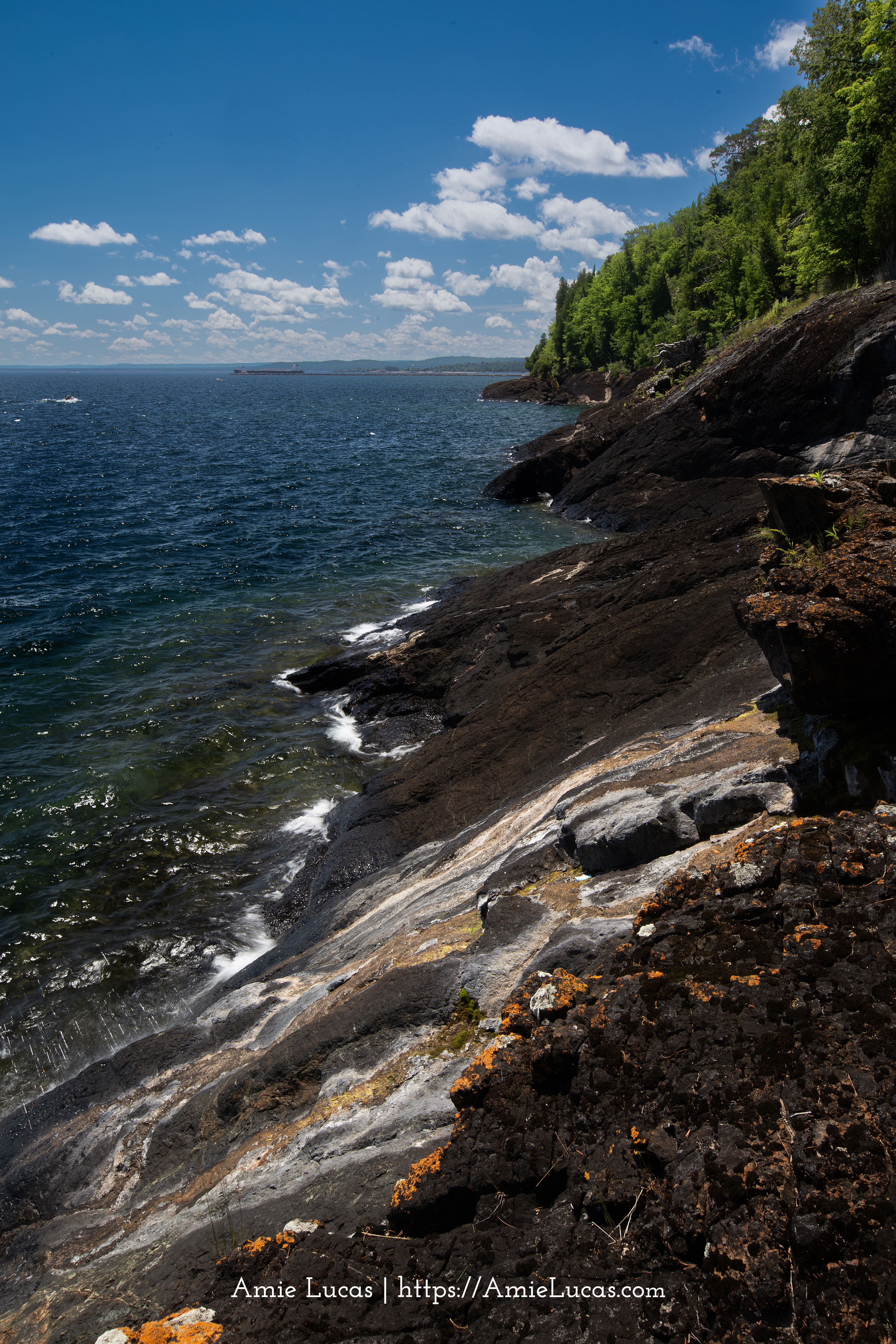 Black rock shoreline along Lake Superior