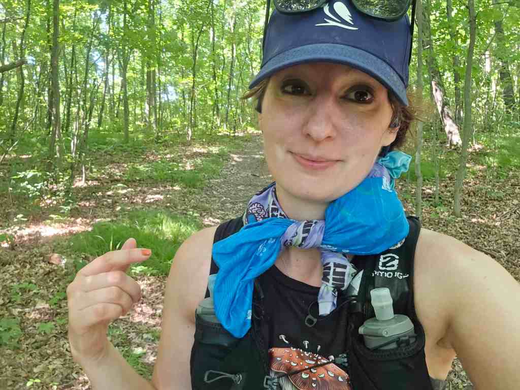 Amie point toward her ice bandana after fresh ice was added