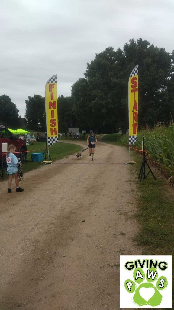Amie and Dakota crossing the finish line